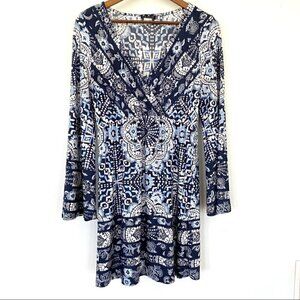 Venus stretch mini dress with surplice top and bell sleeves